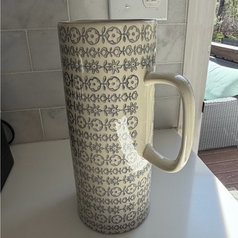 Bloomingville ceramic pitcher/vase featuring a retro floral pattern. Cream/gray
